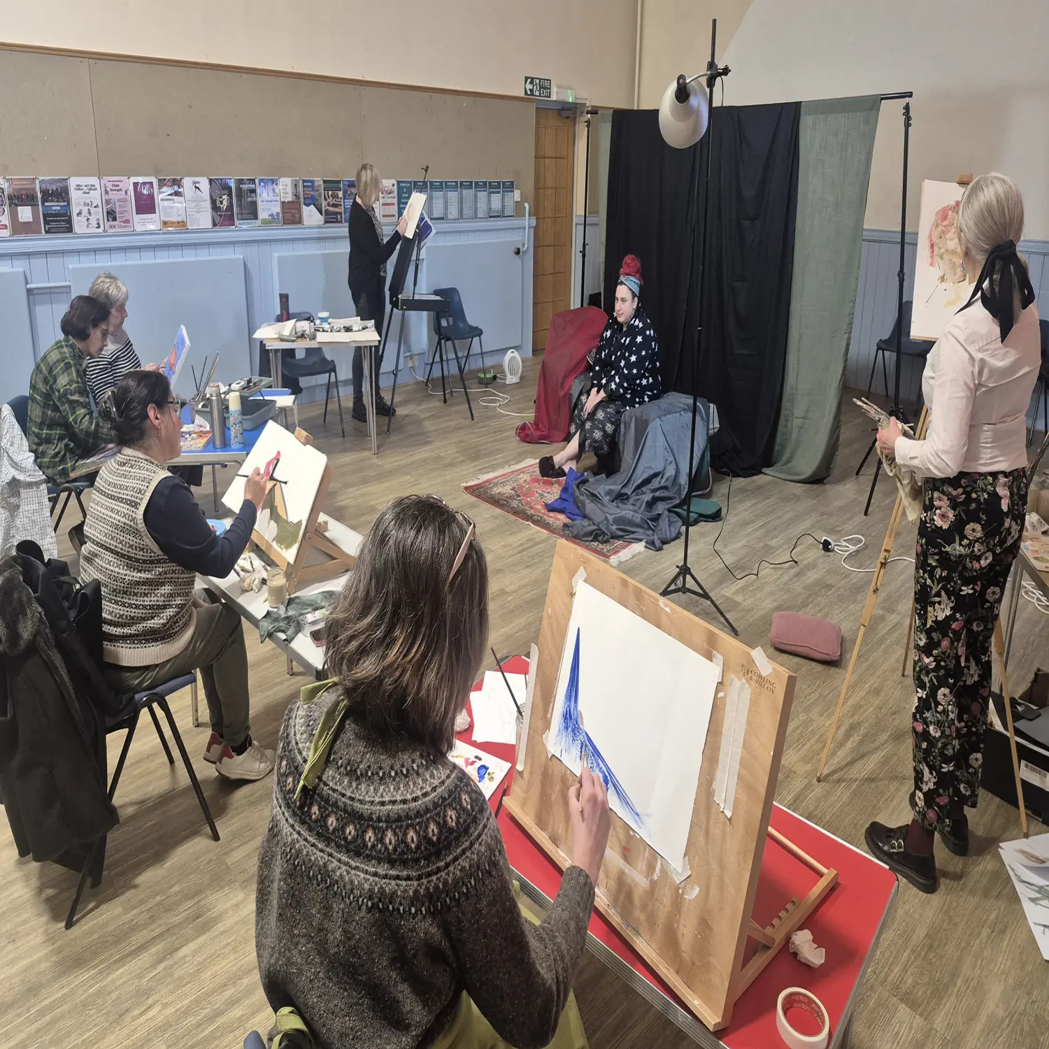 Artists at work during a life drawing session at Great Western Road Community Centre, Aberdeen